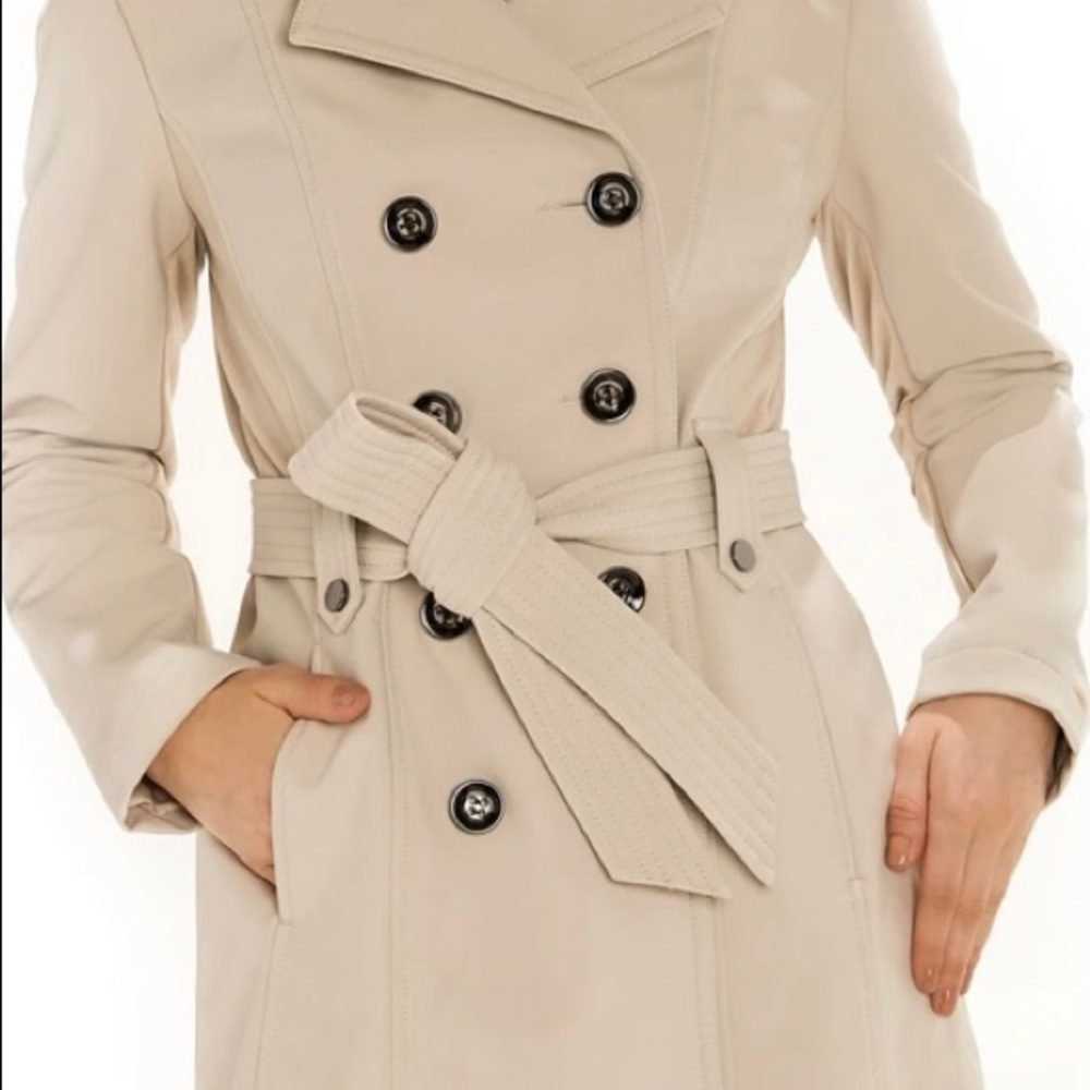 Tan trench coat with pockets and belt.